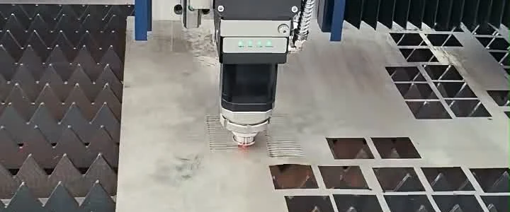 Fiber laser cutting machine processing stainless steel kitchenware components with smooth burr-free edges and precision holes on thin gauge sheet metal