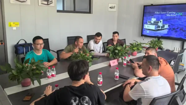 visiting clients disscuss industrial laser solutions
