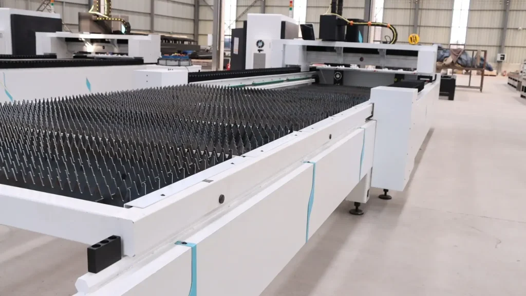 Dual exchange pallet shuttle table on a high-power fiber laser machine in production