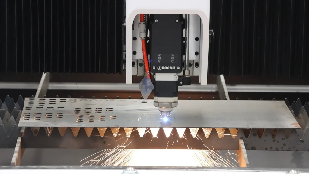 Fiber laser cutting machine running high-speed air assist cutting on sheet metal