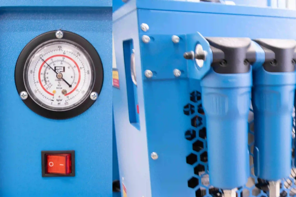 High-pressure air compressor and filtration system installed for laser cutting assist gas with pressure gauges visible