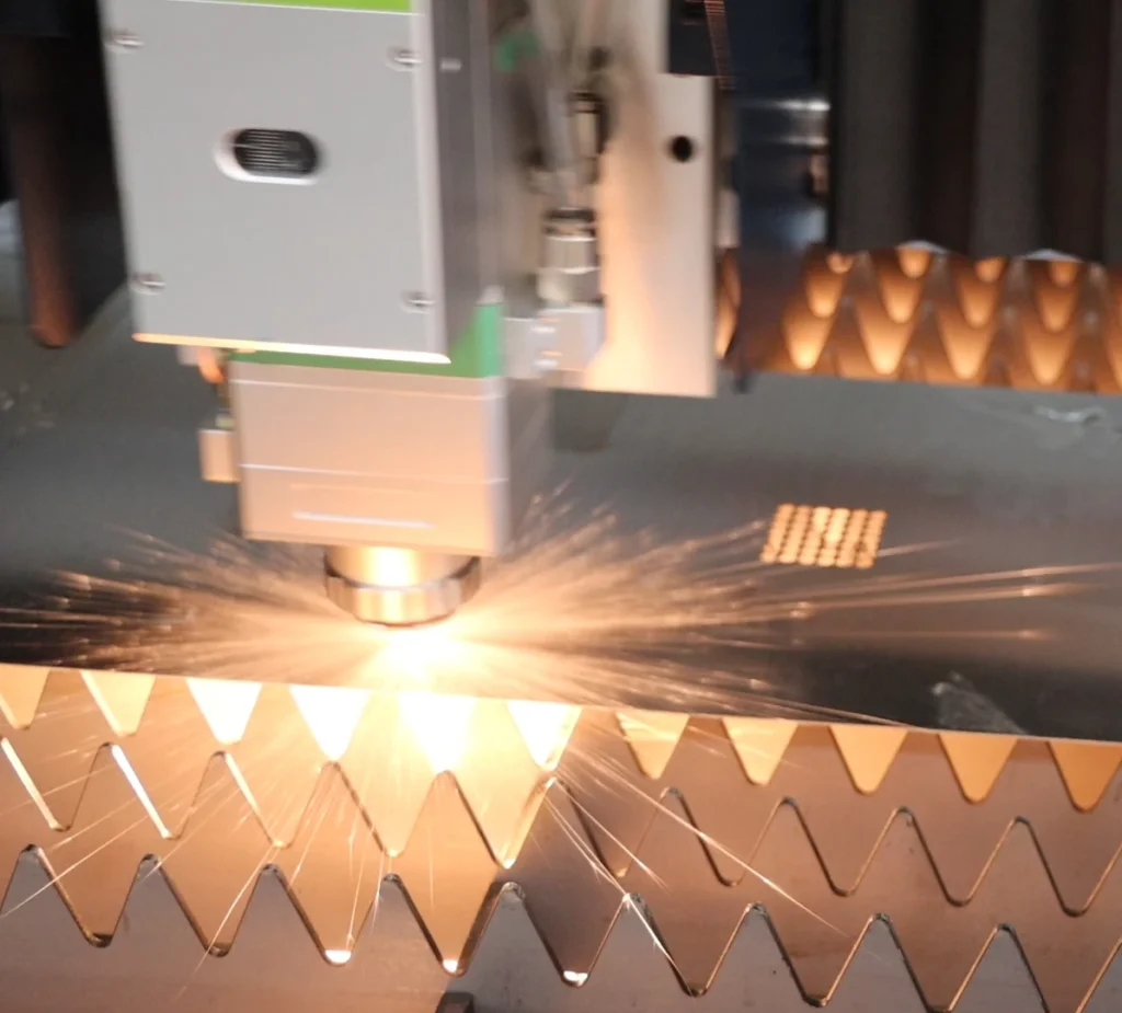 Fiber laser cutting head processing carbon steel with compressed air assist