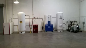 Liquid nitrogen storage tank and air compressor system outside a laser cutting workshop
