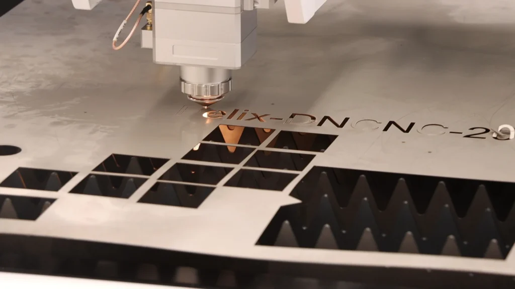 Fiber laser cutting machine processing thin stainless steel sheet for signage production