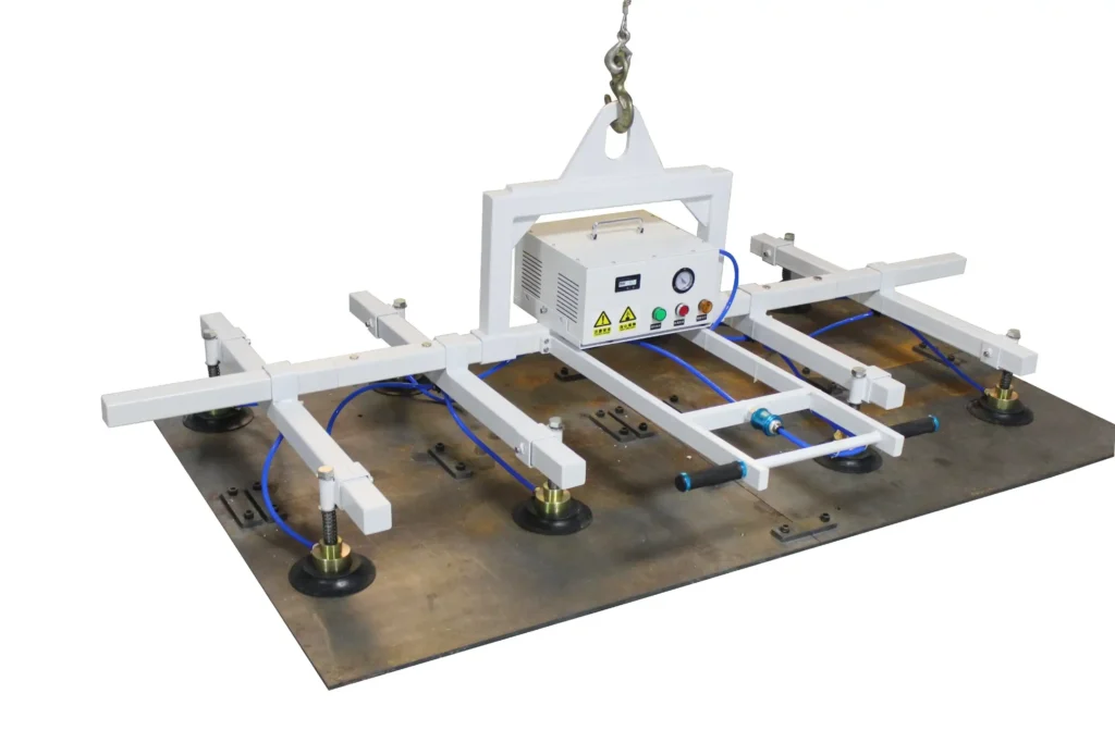 Vacuum cup lifting 1mm stainless steel sheet onto laser cutting bed with visible sheet deflection
