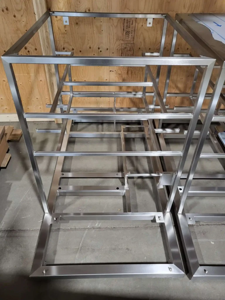 Welded square tube machine frame assembled from laser-cut tubular parts