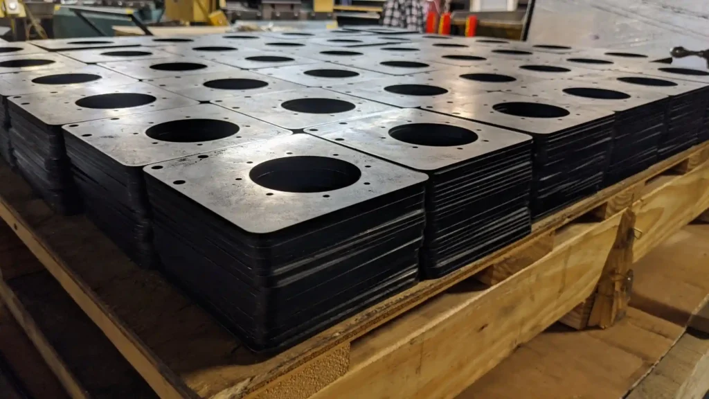 Batch laser cut medium steel plate components insourced on 12kW fiber laser