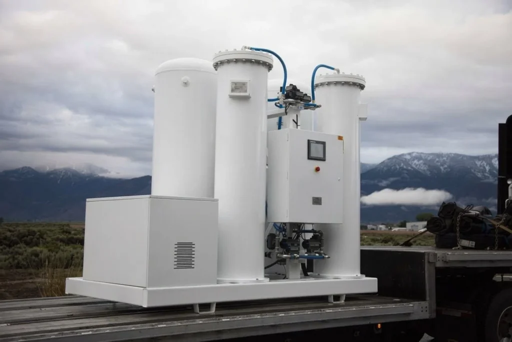 Complete on-site PSA nitrogen generator system with storage tanks installed in a metal fabrication workshop